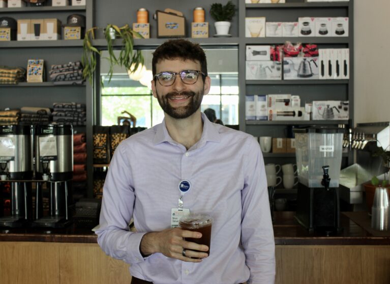 UVA Health team member, Brian Simalchik, buy coffee at Grit using UVA Health discount