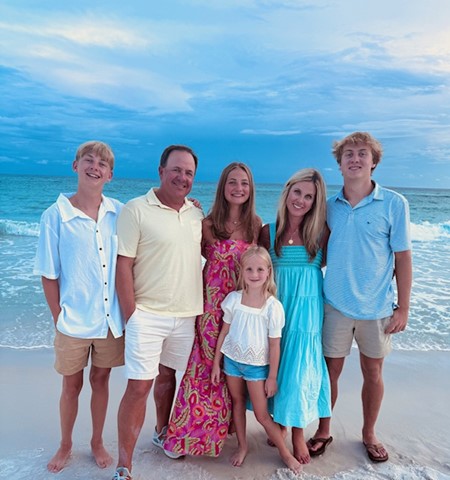 Rachel Nauman and family on beach