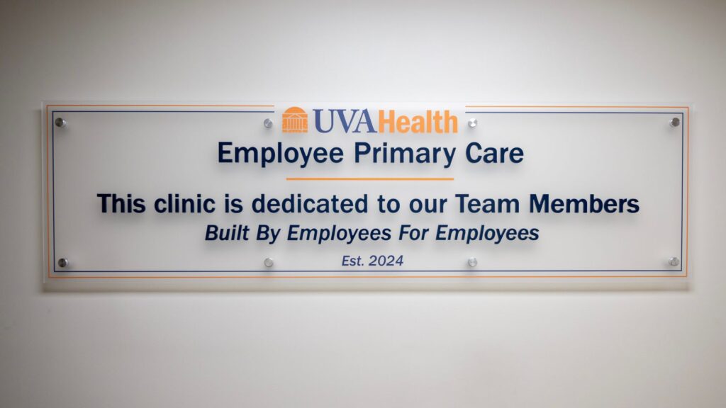 Sign Text: "This clinic is dedicated to our team members. Built by employees for employees. Est. 2024